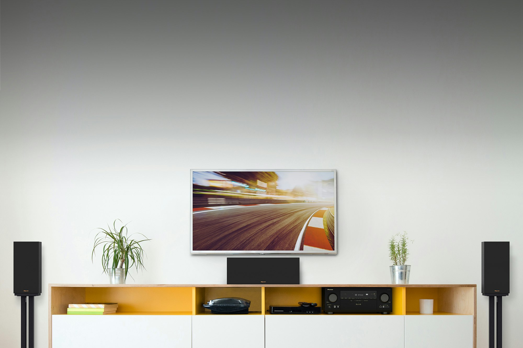VSX 935 With KD Series Bookshelf Speakers Beside TV 2 2000x1333